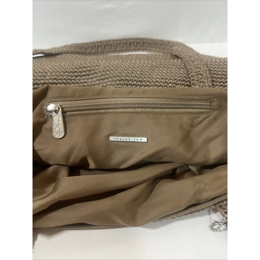 The Sak Crochet Taupe Shoulder Bag Solid  Lined Zip Silver Charm Boho Whimsical